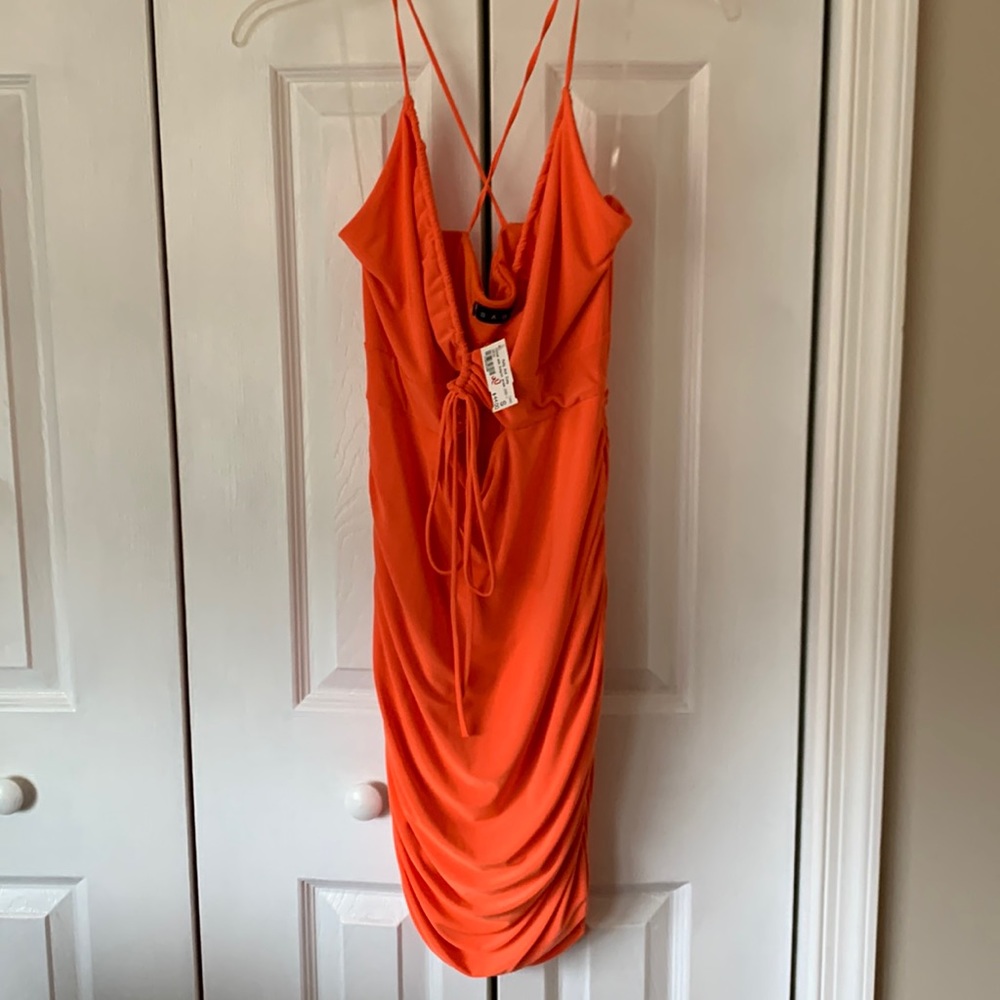 NWT Bodycon minidress, very sexy, tangerine color size small